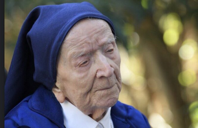 Sister Andre is participating in her daily prayers at age 118 year old. Andre claims that her secret to this old age is    “A little bit of chocolate and wine each day!”