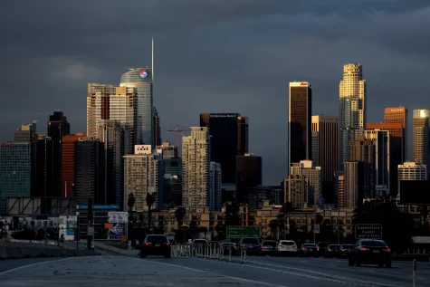 Clouds hovering over downtown Los Angeles after the storm caused power outages and flooding.