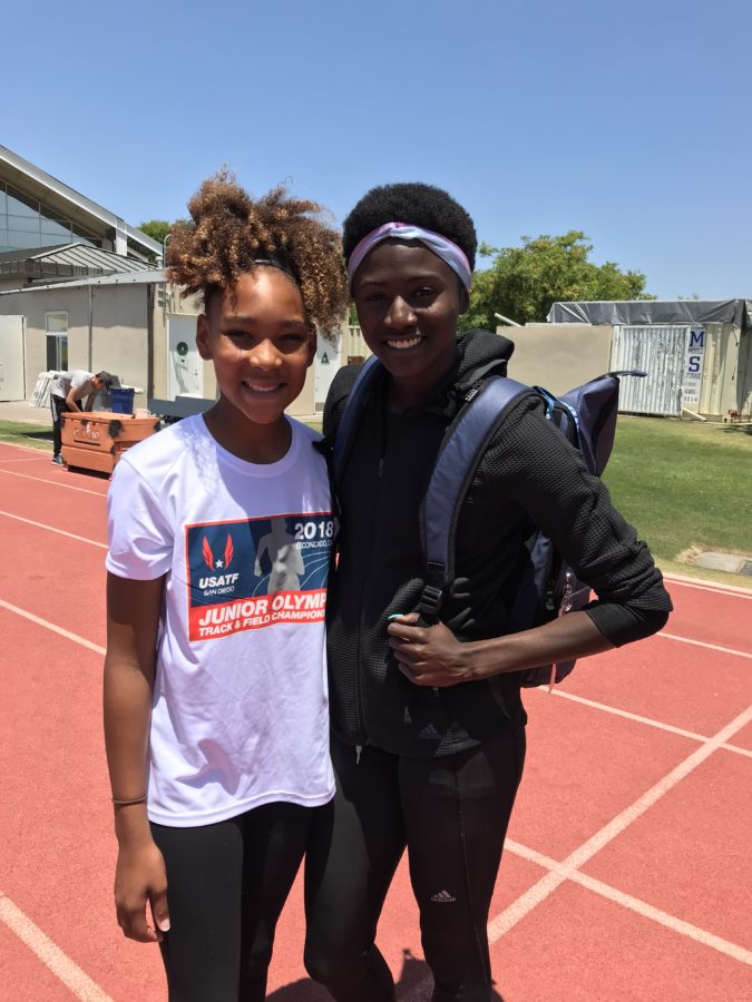 Kapi Coleman ‘23 pictured with Tori Bowie in 2018.