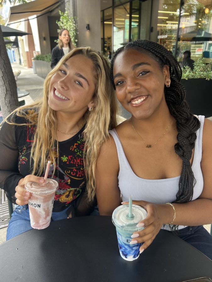 Journalism students Kelli Jackson (right) and Arabella Cassidy (left) enjoy two Erewhon smoothie classics: Coconut Cloud and Strawberry Glaze.
