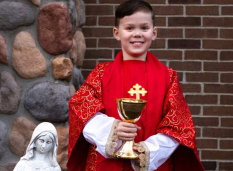 Teddy Howell, the 9 year old podcast creator dressed up as a priest, his dream occupation. This young third grader describes how when he grows up, he wants to be like Schmitz and be a priest at his local church in Michigan.