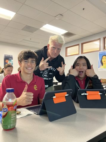 Aaron Dumas ‘24, Rick Lunch ‘23, and Anthony Nguyen’24 show their support for technology in schools. “Technology allows us to interact, create, and work in ways that are not achievable with pen and paper,” Aaron says.