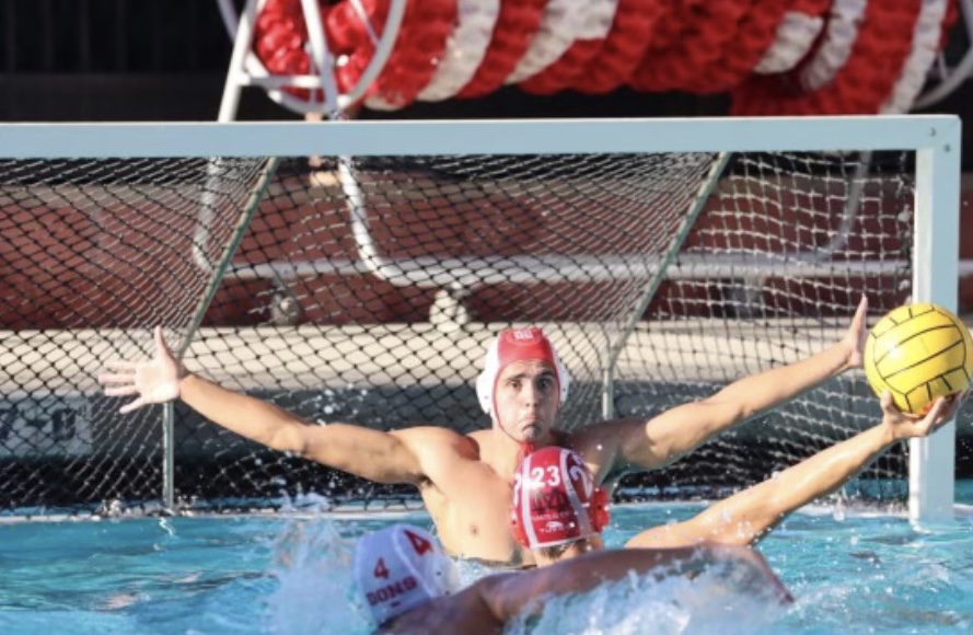 Victor Bonhomme '24 prepares to block a shot from the opposing team.