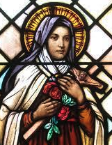 St. Therese of Lisieux is a well known female saint who was named one of the three Doctors of the Church. She is the patron saint of florists and missions.