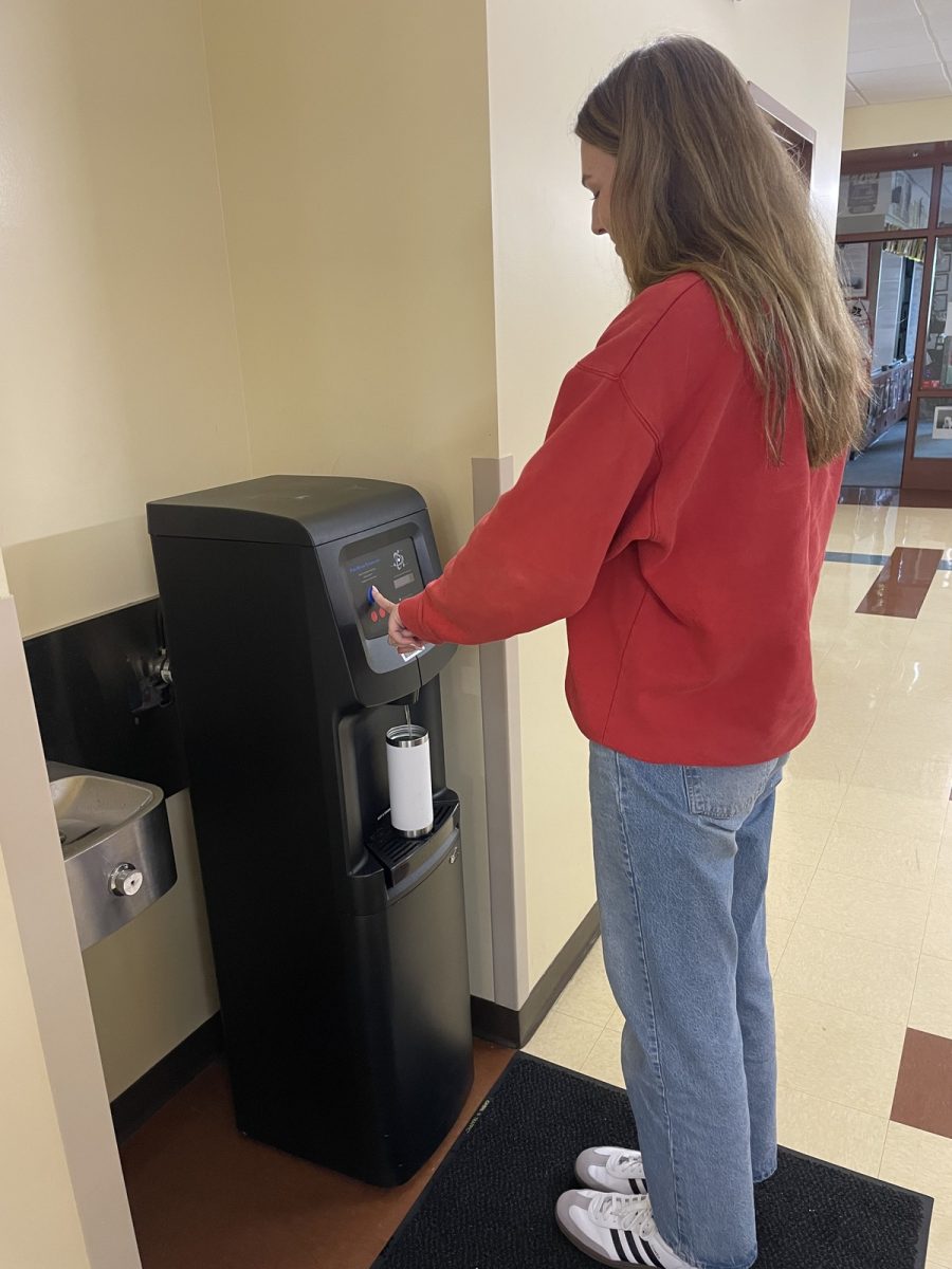 Pictured here is student Mae Kordas as she fills up her water in between classes. Mae decided last summer drinking water should become a better priority.