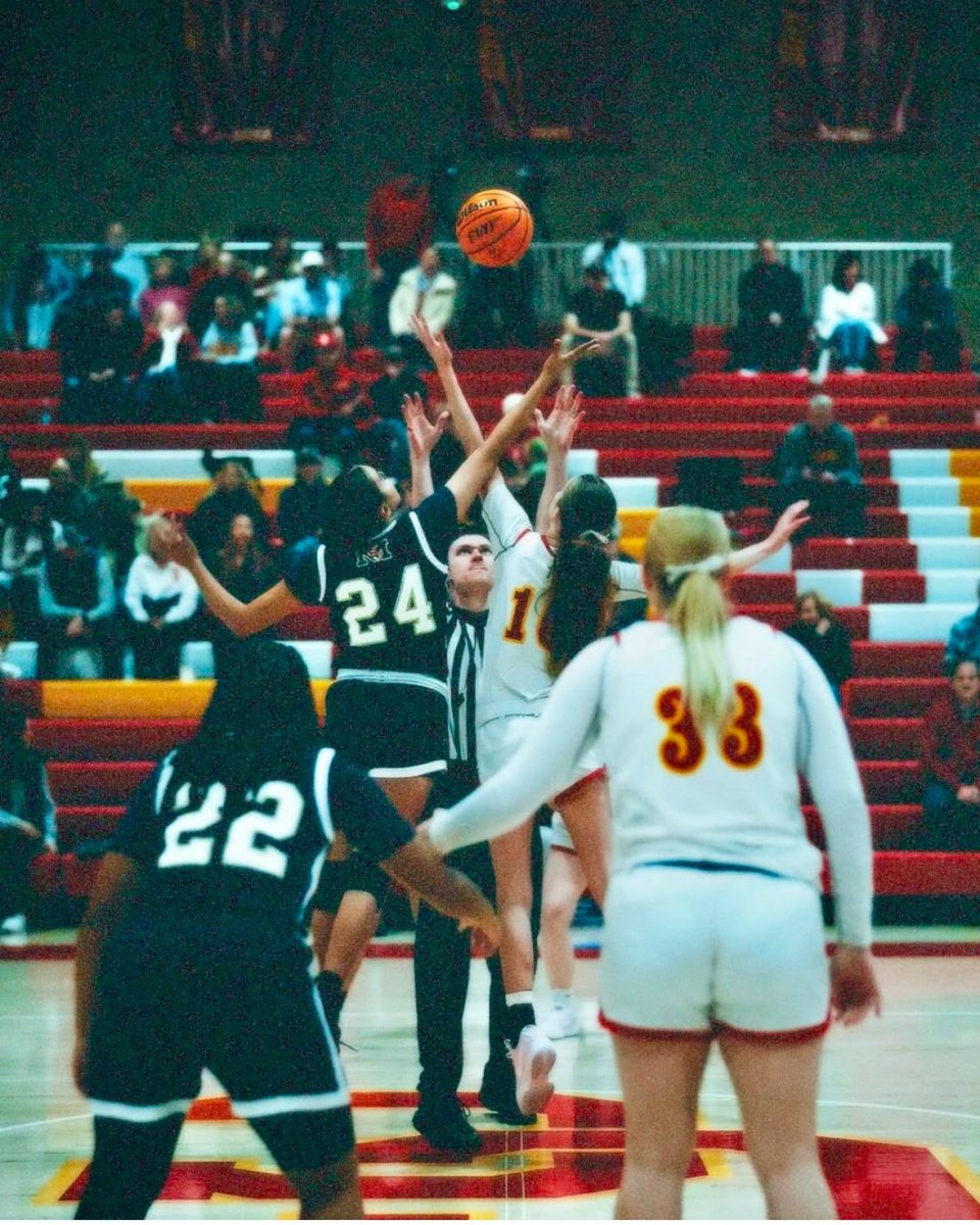 The Cathedral Catholic girls team face off in a tip off to start one of their season games in January.

Photo Credit: @itbdmedia and @cchsdonsgirlsbasketball on Instagram
