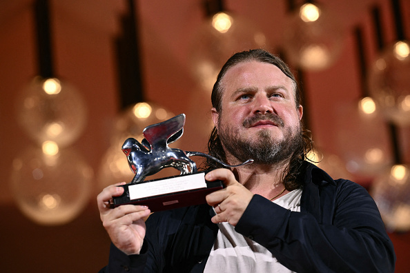 Director Brady Corbet poses during a photocall after receiving the Silver Lion for Best Director for 'The Brutalist' during the award ceremony of the 81st Venice Film Festival on September 7, 2024 at Venice Lido. 

The Golden Lion is one of the most prestigious prizes in the film world. To win it means to be the best in your field of filmmaking as a director and shows the acclaim the film has garnered.

Photo by Marco BERTORELLO / AFP via Getty Images