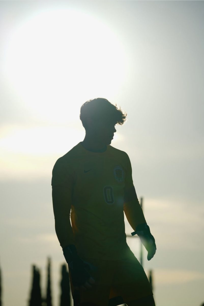 
Blake Webster, captain of the CCHS varsity soccer team, as he prepares for a game.

Photo Credit to Tyler Williams