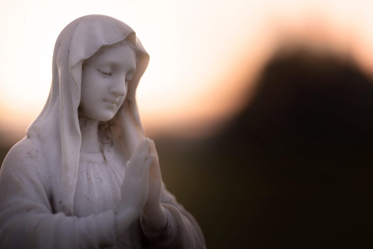 May Crowning is an event in which Catholics honor Mary and bring flowers to a statue of her. 

Photo Credit to Terski on Pixabay