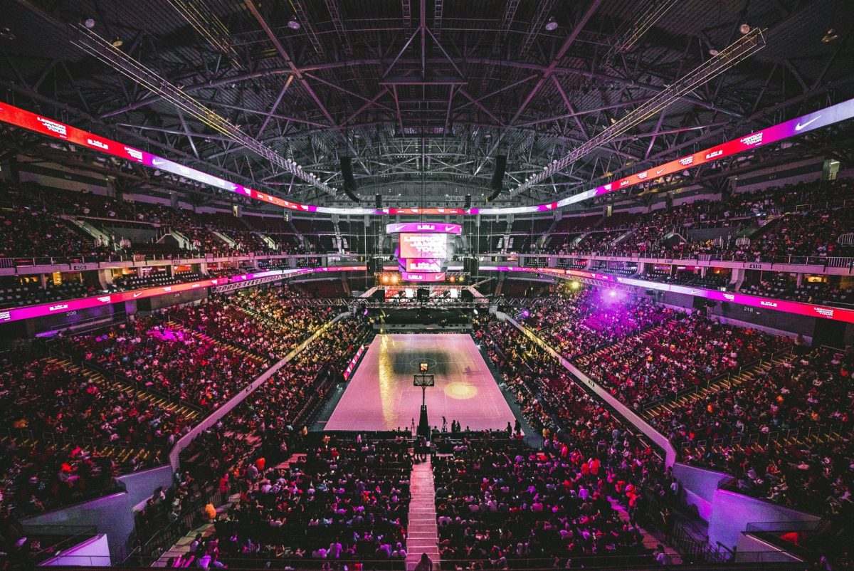 Fans packing into an arena and getting hyped to watch opening night.