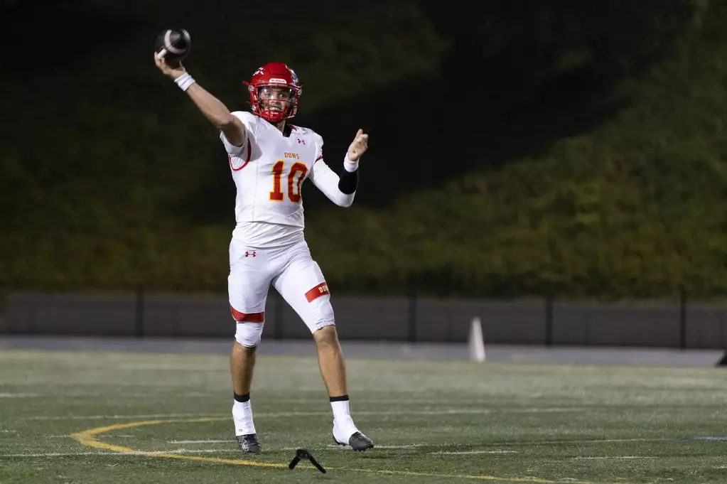 Star Quarterback Brady Palmer throws a pass at the 2024 Holy Bowl.