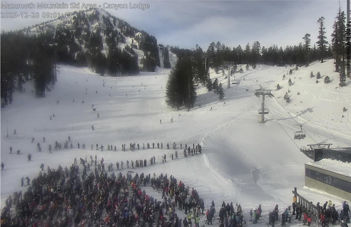 The lines of skiers and snowboarders for the chair lift once the mountains reopened on December 27, 2026.